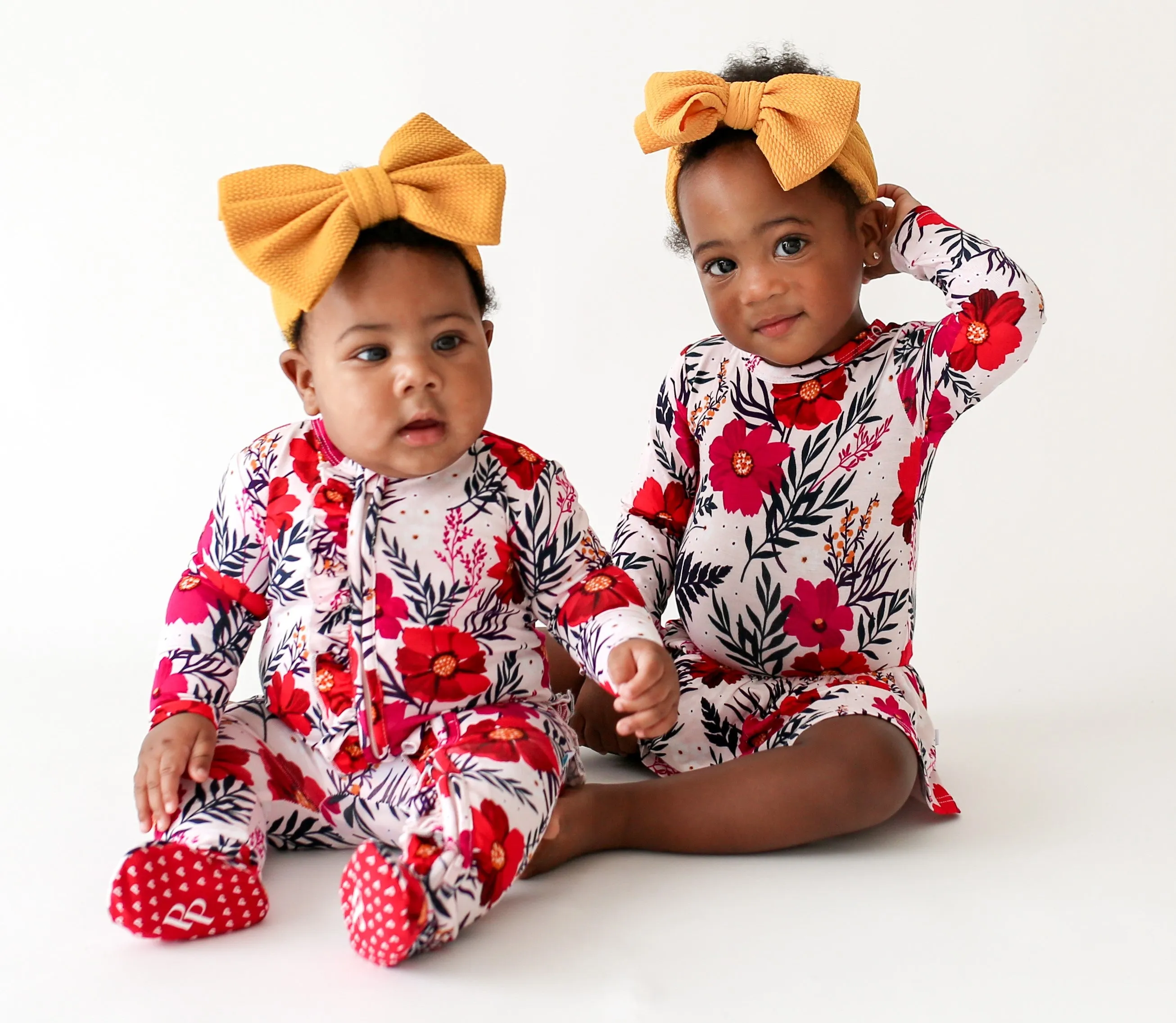 Posh Peanut Chloe Ruffled Zippered Footie