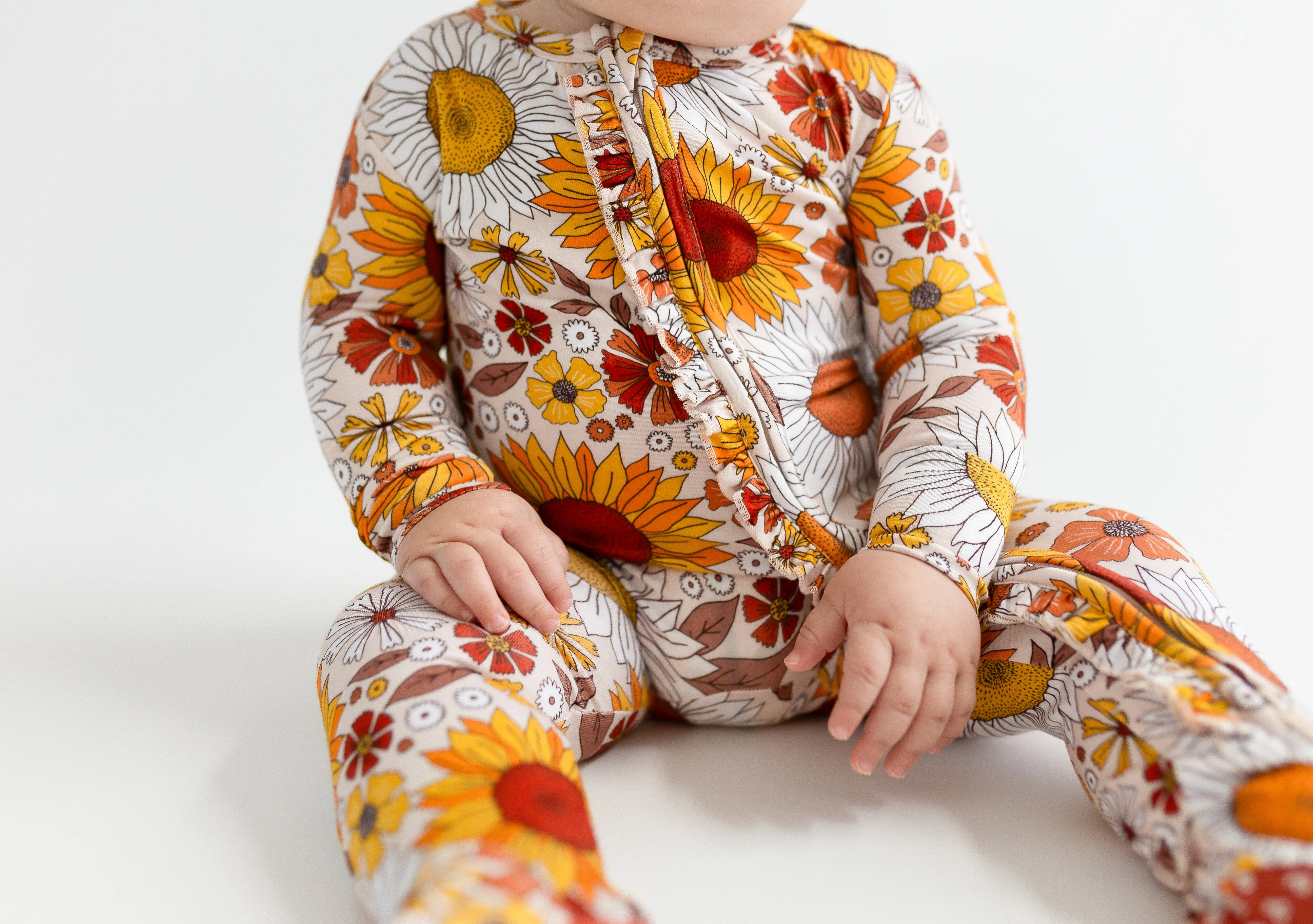 Posh Peanut Goldie Ruffled Zippered Footie