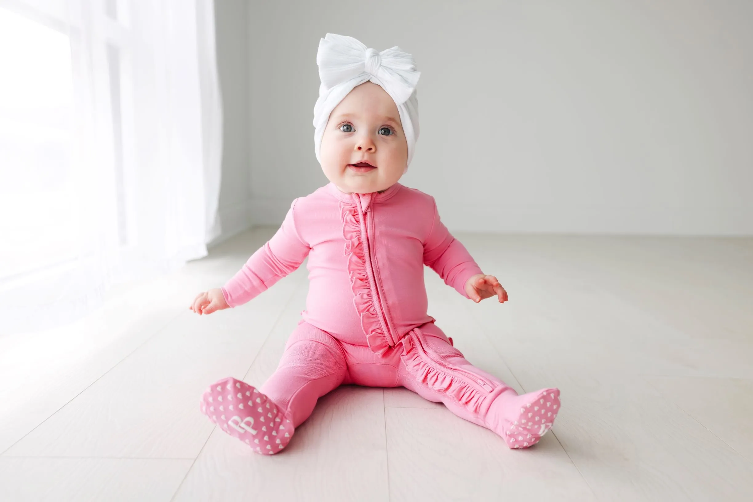 Posh Peanut Pink Lemonade Ruffled Zippered Footie
